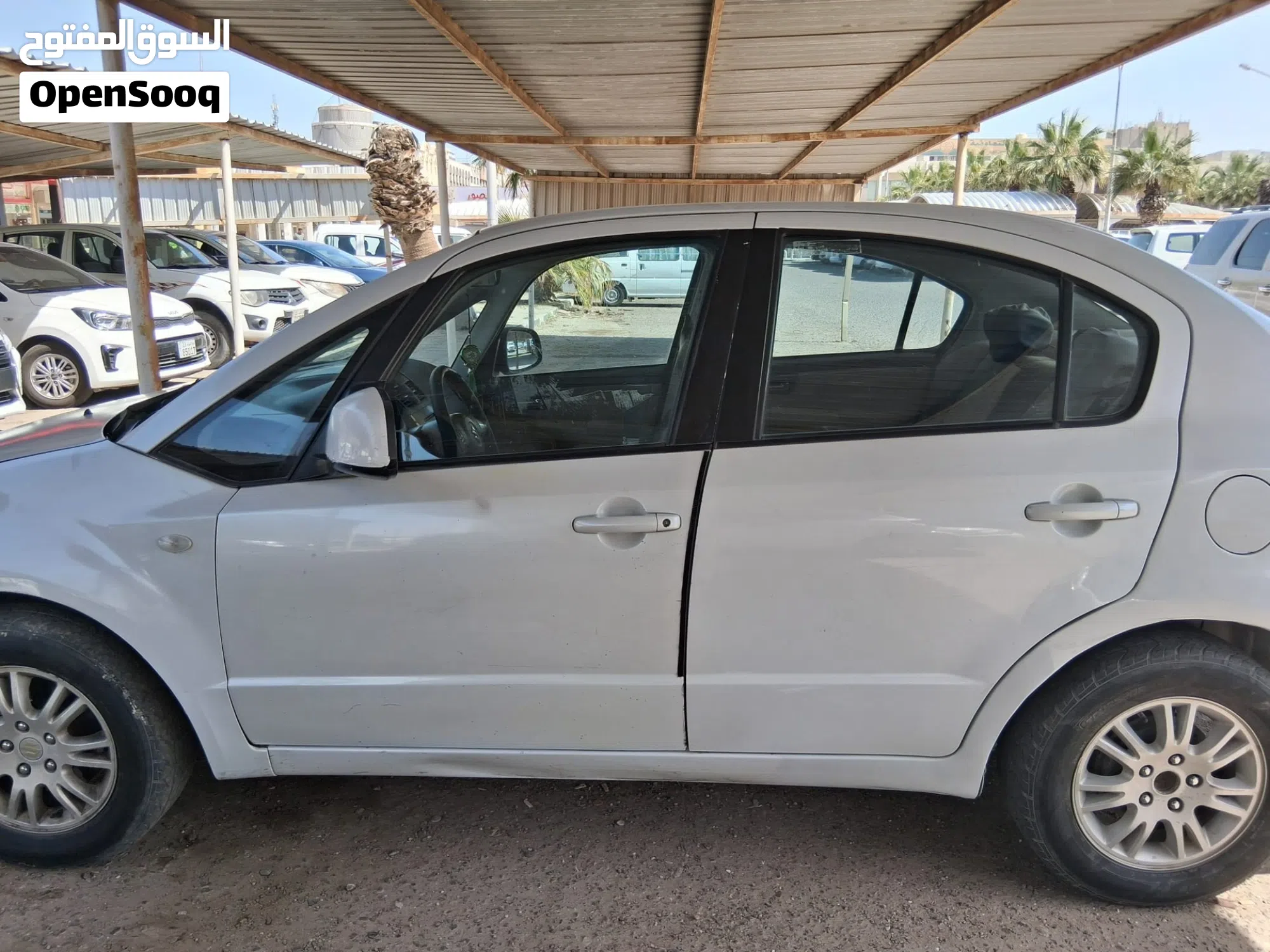 سوزوكي SX4 2014 GL أبيض – اقتصادية بسعر مناسب - image 1